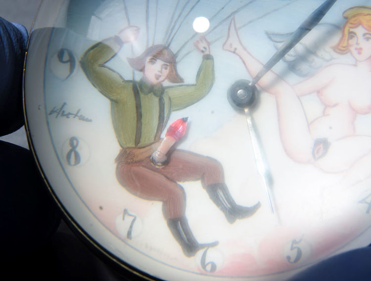 Picture of Man with Parachute and Angel Ball Clock
